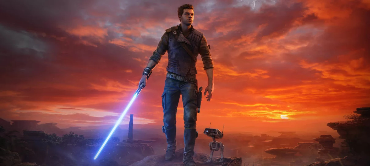 A imagem mostra o personagem de Star Wars Jedi: Survivor segurando um sabre de luz com um droide ao seu lado.