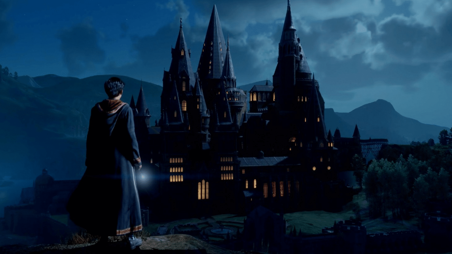 Imagem de bruxo em frente ao castelo de Hogwarts em Hogwarts Legacy