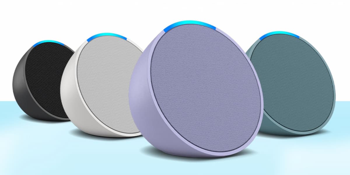 nova alexa da amazon echo pop, caixa de som semelhante a bola cortada ao meio em 4 cores, branco, preto, roxo e verde