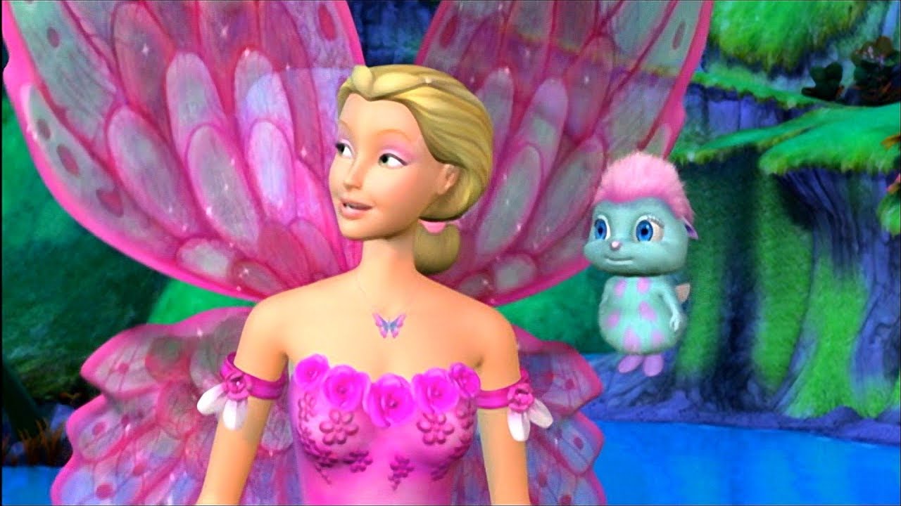boneca barbie com asas de borboleta e criatura fofa azul ao lado dela