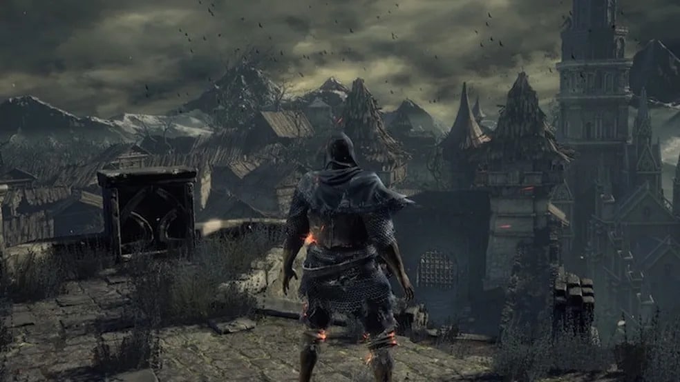 personagem do jogo dark souls em estilo medieval olhando para paisagem