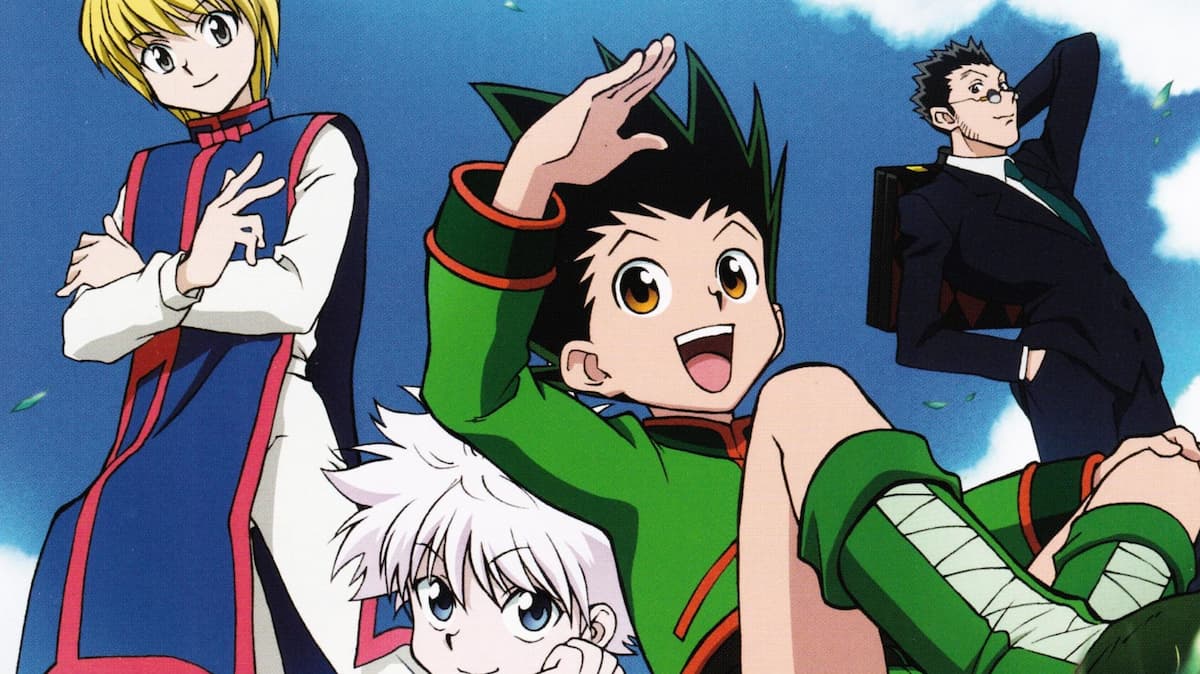 personagens do anime hunter x hunter com destaque para o protagonista criança de cabelo preto espetado e roupa verde e vermelha.