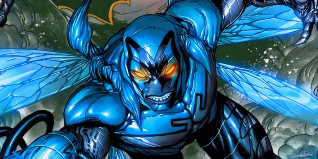 personagem besouro azul em história em quadrinhos, homem com armadura azul com detalhes de besouro
