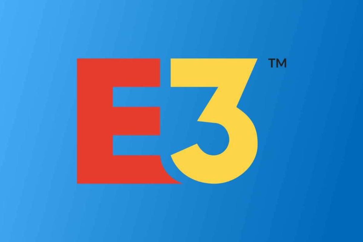 Pôster de divulgação do evento E3. Trata-se da escrita da letra E em vermelho e do número três em amarelo em um fundo azul.